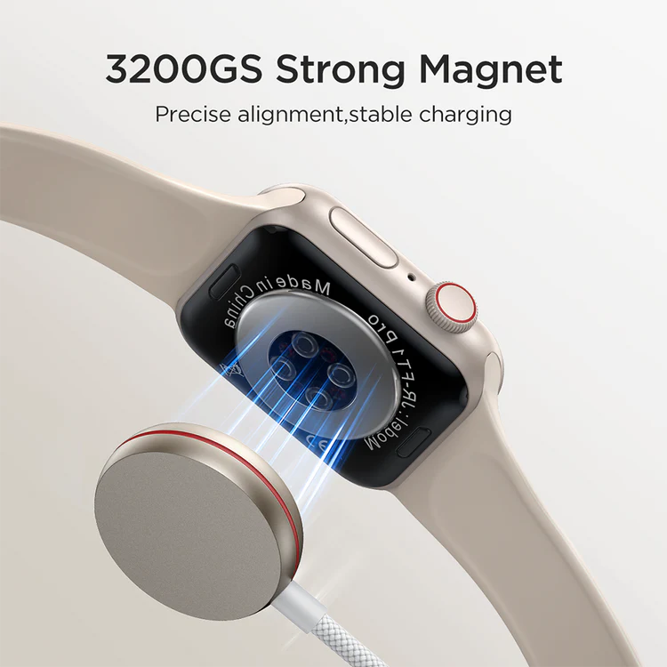 Magnetic charging puck on white cable with USB-C end, close-up on alignment