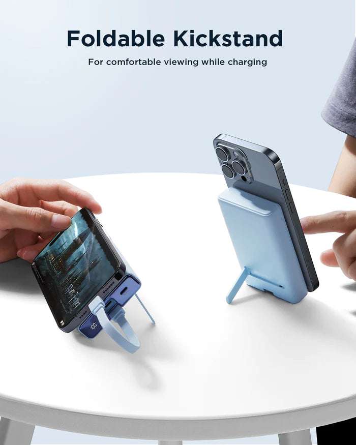Foldable kickstand power bank; phones angled upright while charging