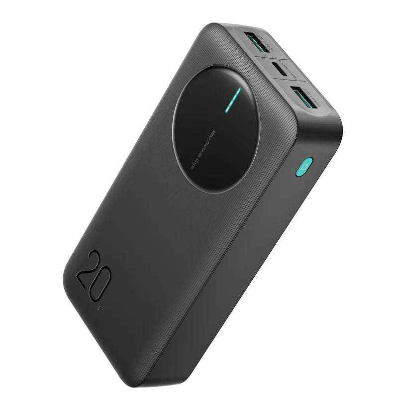 Textured portable power bank with circular LED display and three USB ports
