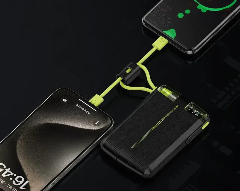 Black power bank with lime-green built-in cables connected to a smartphone