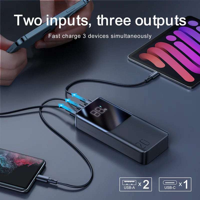 Black power bank with connected cables and dual charging output ports