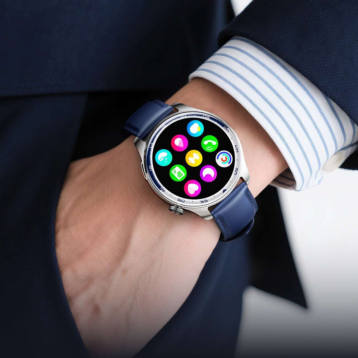 Smart watch on wrist with dark blue strap and colorful app-style icons